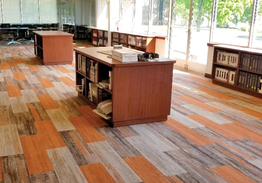 Advantage Flooring, Inc. uses this space as a showroom and conference room.