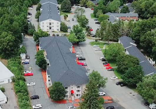 Over the past five years, Red Dog’s Roofing has replaced the eight roofs on Town & Country apartment complex buildings in Leominster, MA. The roofs were installed by Owner Patrick Cochran’s grandfather, the original “Red,” in the 1980s. 