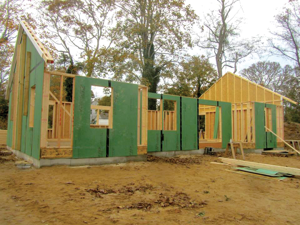 This Habitat for Humanity home in Harwich, Massachusetts, is near the end of a wall-raising day with community volunteers. Over the past 15 years, J.M. O’Reilly & Associates, Inc. has played some role in the construction of about 60 homes for Habitat for Humanity of Cape Cod.