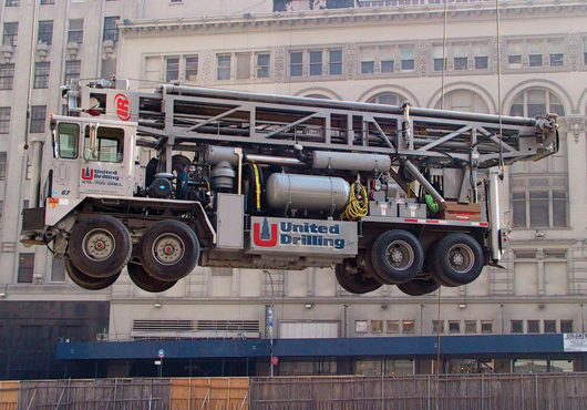The T4 rig appears to float on air as it prepares to be lowered to the basement of the project at 731 Lexington Ave., New York City.