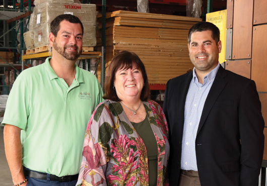 Cameron Building Envelope Specialists CEO Ginny Cameron (center) with sons Vice President Andrew Cameron (left) and President Scott Cameron are leading the family business into its fourth generation of ownership.