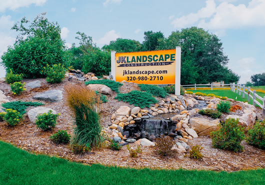 Landscape design and waterfall at JK Landscape Construction LLC’s headquarters in Clearwater, Minnesota.