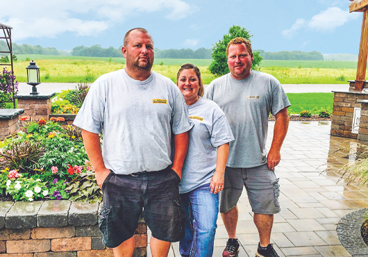 Left to right: JK Landscape Construction LLC Owners Jerry and Holly Konz with Estimator Scott Winkelman at the company’s headquarters.