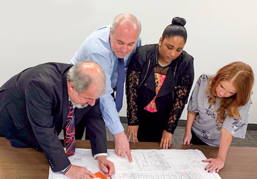 A major fire sprinkler and fire alarm system installation brings together Absolute Protective Systems, Inc. team members (from left to right) Senior Project Manager Michael Dellabella, Sales Engineer Dan Clark, Service Coordinator Taahira Parks and Heather Reedy of the Sales team.