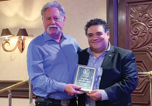 David Luhm, Project Manager at Countywide Mechanical Systems (left), is honored as ASPE San Diego “Estimator of the Year” by President Paul Chang, Preconstruction Manager at Balfour Beatty, during the chapter’s annual awards ceremony in 2019.