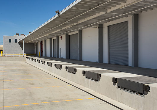 Exterior and site improvements at this industrial property in San Leandro, CA, included the construction of elevated, recessed docks in place of grade-level freight truck parking.