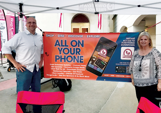 Rich Gentile (left), founder and CTO at RSN Digital Inc., and Dru-Anne Palaima, of the Downtown Freehold Community Organization, know that applications and beacons can benefit construction and engineering firms of any size.