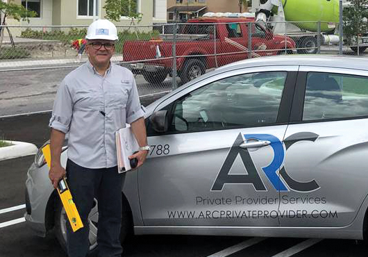 ARC Private Provider Services, Inc. handles on-site building inspections as well as plan reviews. Shown here is Building Inspector Richard Rubi arriving at a Liberty Square project site in Miami.