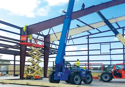 Ahrens Companies’ staff erecting a metal building system in Hangar C of the Sebastian Municipal Airport in Florida. 