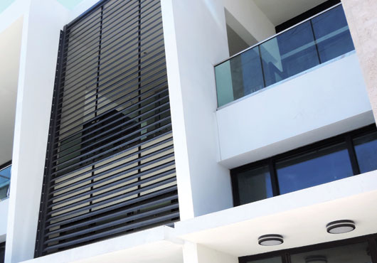 Aim Con Steel installed the louver and glass railing at a commercial retail building in Miami Beach, Florida.