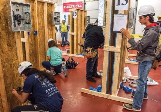 Students competing in the Skills Challenge showcase their talents in the electrical division. Winners take home tools donated by local contractors. 