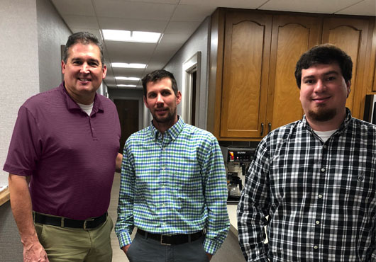 From left to right: members of the J.G. Coram Company, Inc. team, Jerry Coram Jr., Buzz Wilmoth and Zach Draughon.