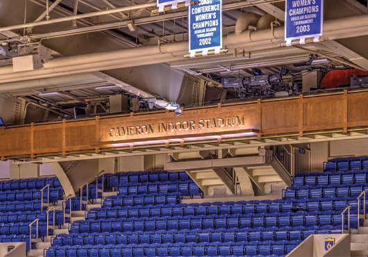 The Crow’s Nest, featuring white oak paneling, was completed in August 2018 by Thompson Millwork. It is a featured area within Duke University’s Cameron Indoor Stadium, which serves as the indoor athletic venue for the Duke Blue Devils.
