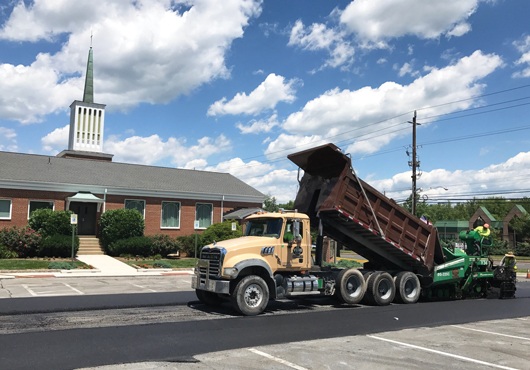 Paving gets underway at a church parking lot. 