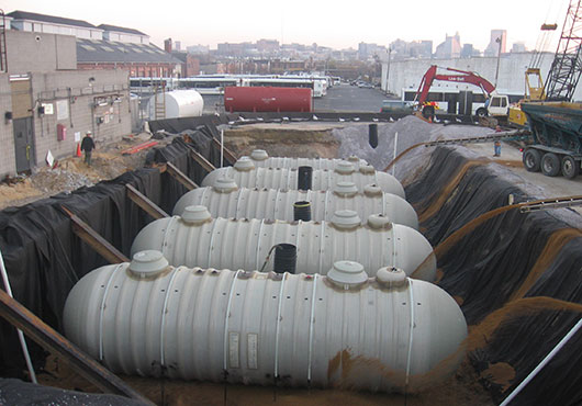 New fuel tanks in place at Maryland Transit Administration in the process of being backfilled using stone shooters.