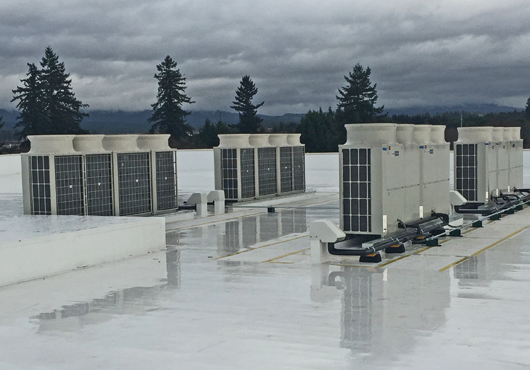 Crews put in these new variable refrigerant flow (VRF) heat pumps at a storage facility in Vancouver, WA.