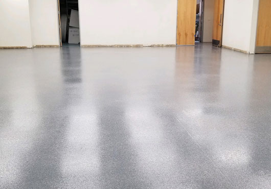 A flooring project completed by Valley Paint & Coatings at the George Brazil School of Plumbing Service and Repair in Phoenix.