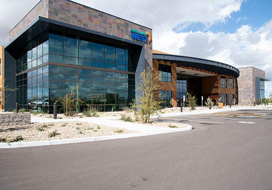 An exterior view of the Credit Union West headquarters in Glendale, AZ. In 2017, Decca partnered with project leaders to adjust the building’s design to accommodate the credit union’s budget and then built the complex. 