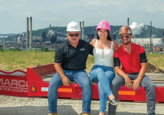 DiMarco Construction Co., Inc. continues its family tradition, with President and CEO Phillip DiMarco (left) working with daughter, Christina, who handles marketing, and son, Domenic, who is Vice President of Field Operations.
