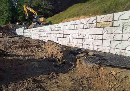 The challenging repairs on Fox Run Road involved slide repair and a 200-foot magnum stone retaining wall. 
