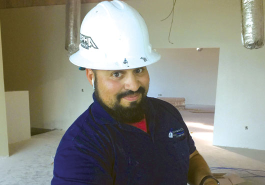 Lead technician Eric Douglas at the California Center for Sustainable Energy jobsite.