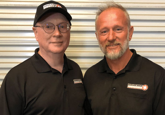 Randall George (left), Garage Door Medics’ Chief Operating Executive, and President Mick Dapcevic.