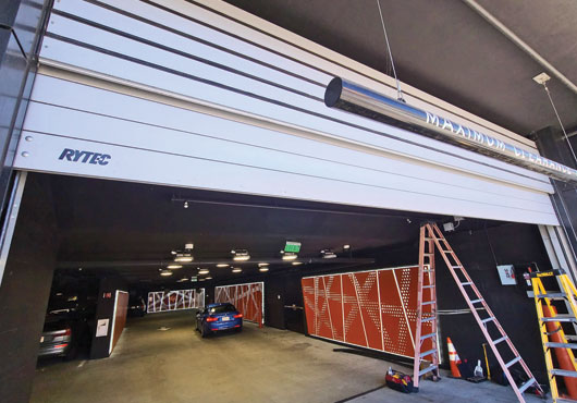 Garage Door Medics installed a new door and operating system for an underground parking garage. 