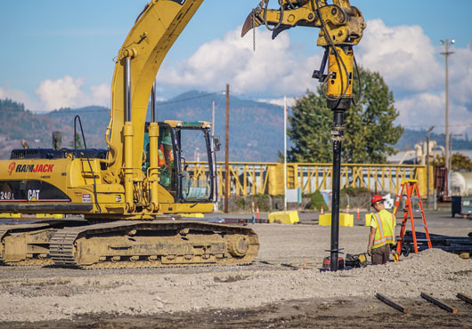 One of the advantages of using larger excavators is they allow Ram Jack West to install longer extensions, as shown here, cutting down on both cost and installation time.