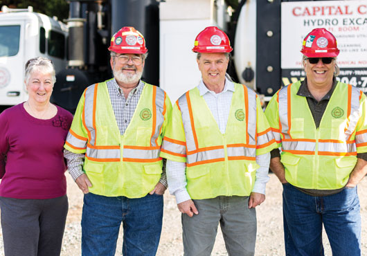 Key members of the Capital City Services team (from left to right): Faye Lickey, Financial Officer; Wayne Norman, President and Founder; Tim Whitlock, Vice President of Environmental Division; and Tom Arezzi, Director of Operations.